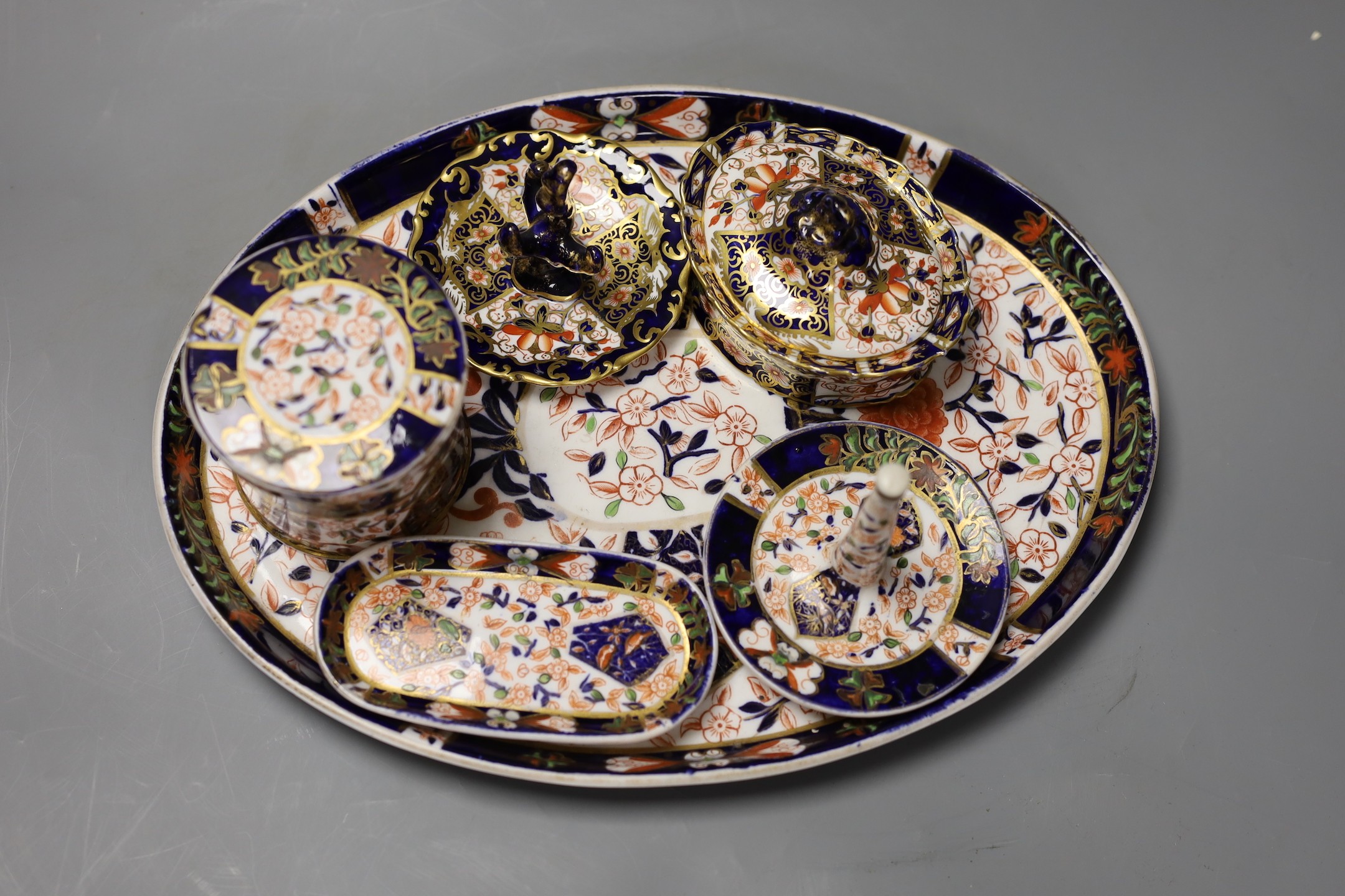 A collection of Royal Crown Derby and Crown Derby wares, including a cabaret tray, two ring stands, etc., (6 pieces)